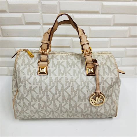 fake michael kors geldbeutel|Michael Kors counterfeit purses.